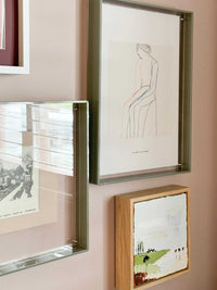 Minimalist line art "In This Moment Print" digital downloadable wall art in modern frame displayed on beige wall.