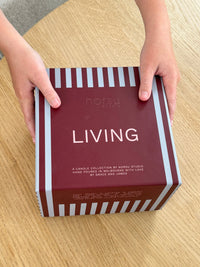 norsu Studio Flow burgundy ceramic scented candle with Antibes fragrance and ruffled edge design