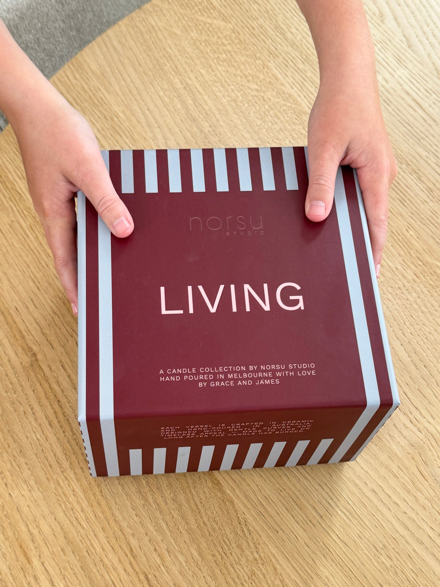 norsu Studio Flow burgundy ceramic scented candle with Antibes fragrance and ruffled edge design