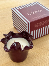 norsu Studio Flow sculptural ceramic scented candle in burgundy with Antibes fragrance