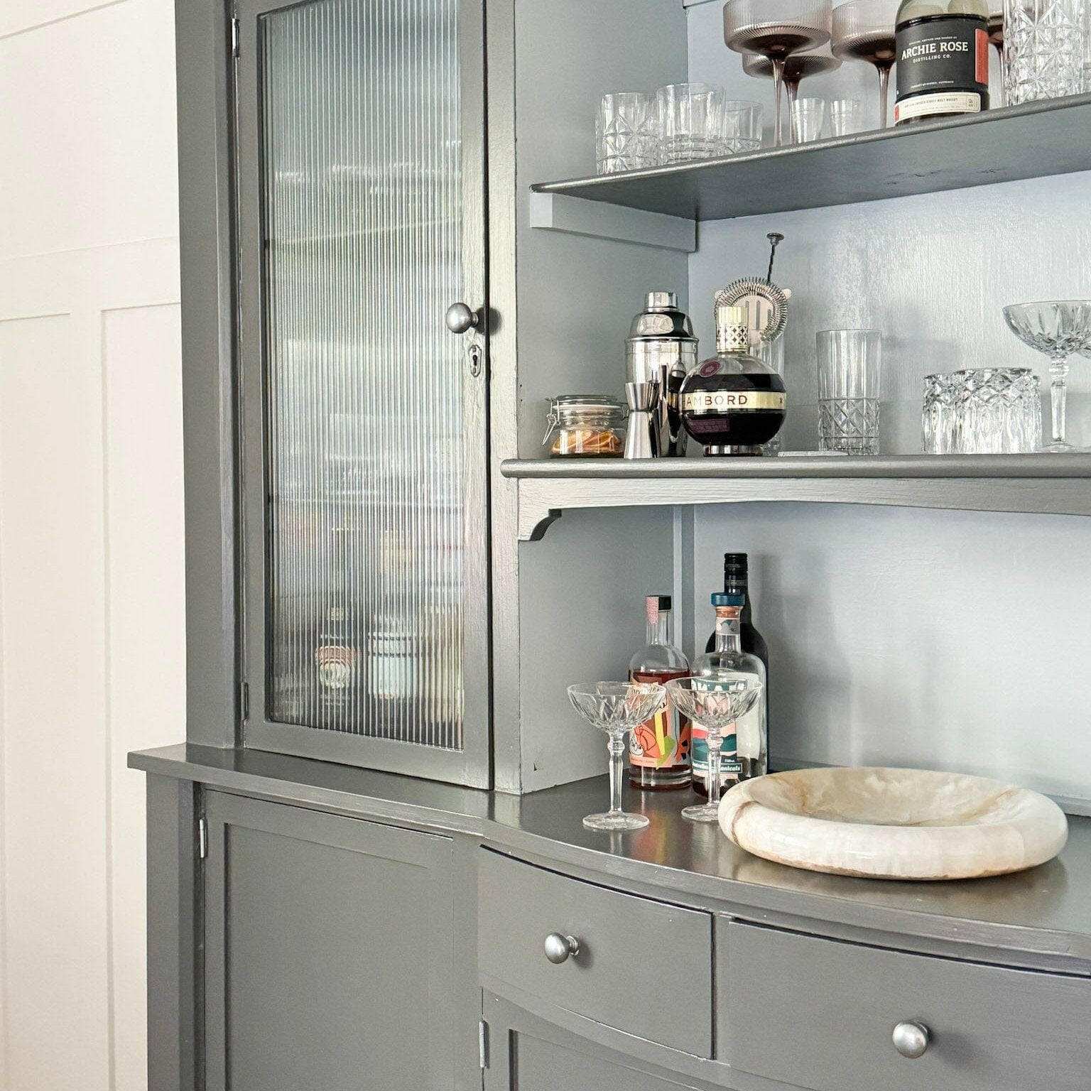 CoTheory Onyx Tray Solstice large white onyx sculptural serving tray on grey cabinet sideboard
