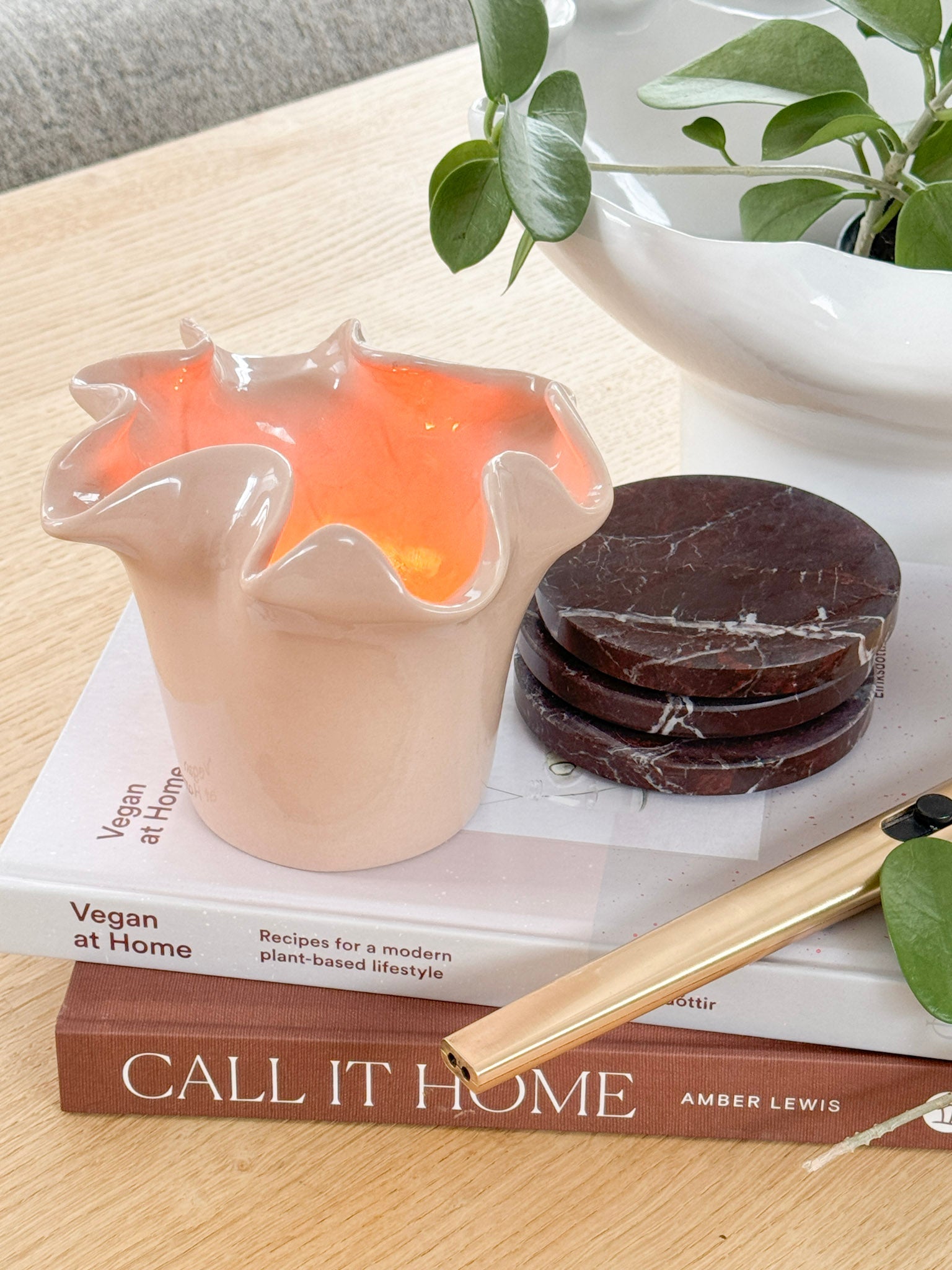 norsu Studio Flow sculptural ceramic scented candle in blush with Alhambra fragrance and ruffled edge design
