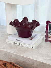 norsu Studio Flow burgundy sculptural ceramic bowl with ruffled edge and glossy finish