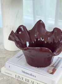 norsu Studio Flow sculptural ceramic bowl in burgundy with organic ruffled edge and glossy finish