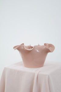 norsu Studio Flow sculptural ceramic bowl in muted blush with ruffled edges and glossy finish