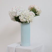 norsu Studio Flow ceramic vase in soft blue with scalloped rim and handcrafted glaze details