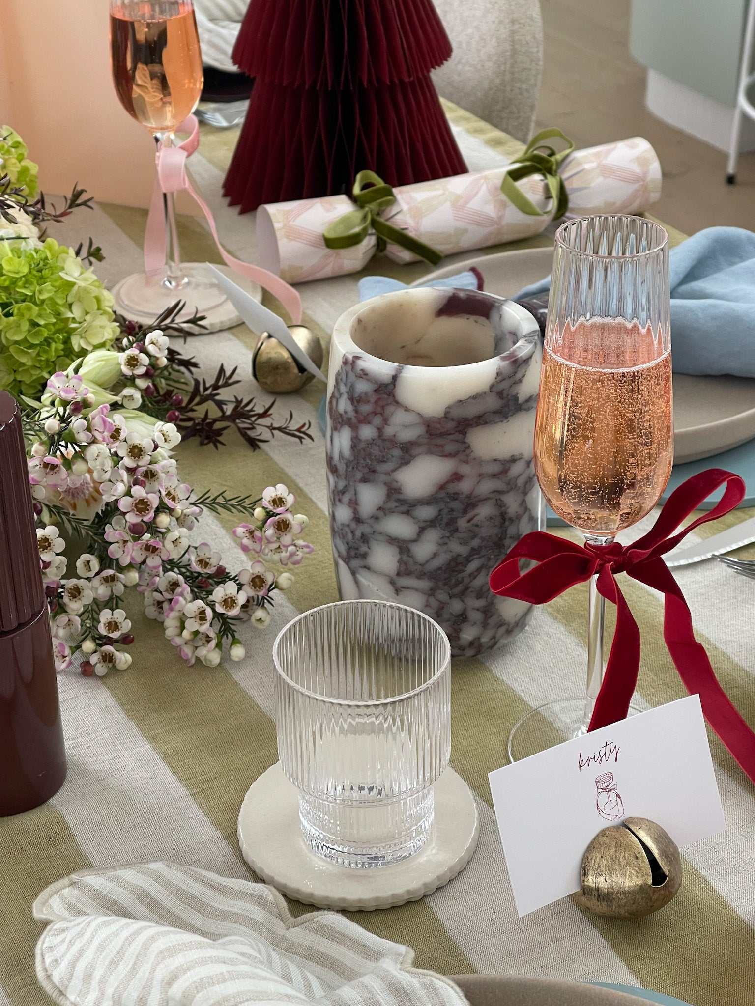 norsu STUDIO Marble Utensil Holder in Viola marble with purple veining on a decorated dining table