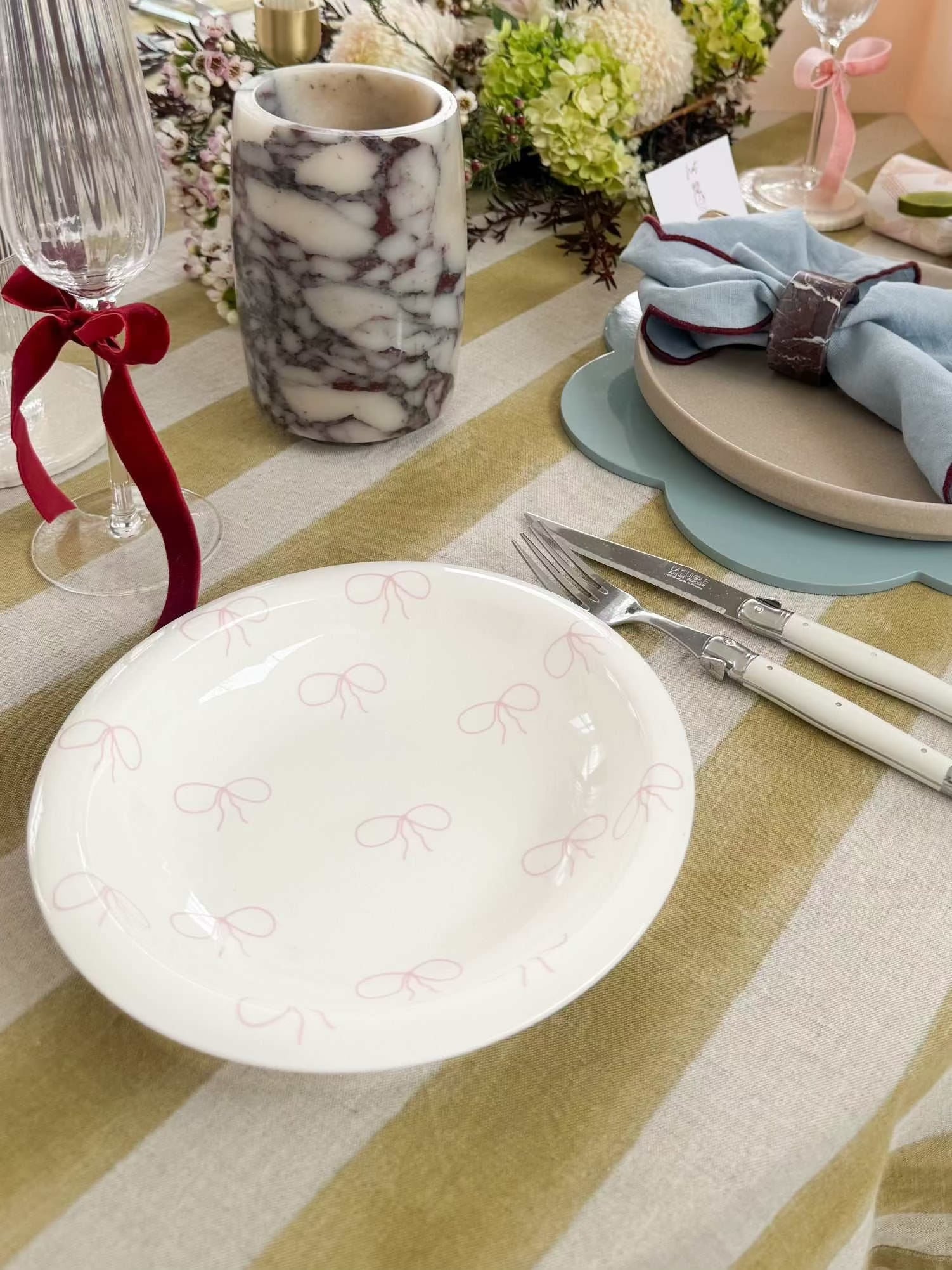 norsu Studio white small bow bowl with pink bow pattern on table setting