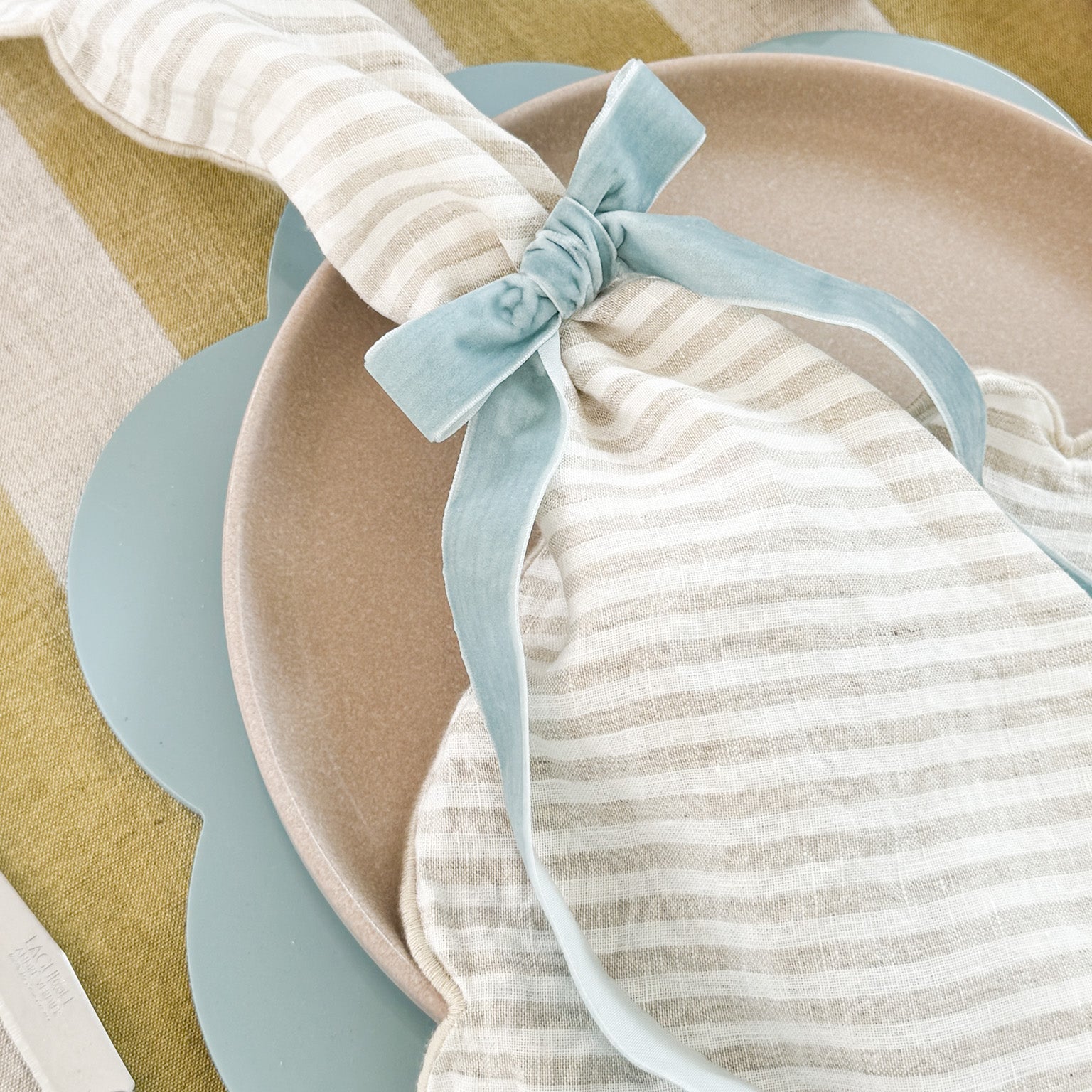 Same Time Tomorrow velvet bow napkin ring in duck egg blue on striped napkin and table setting