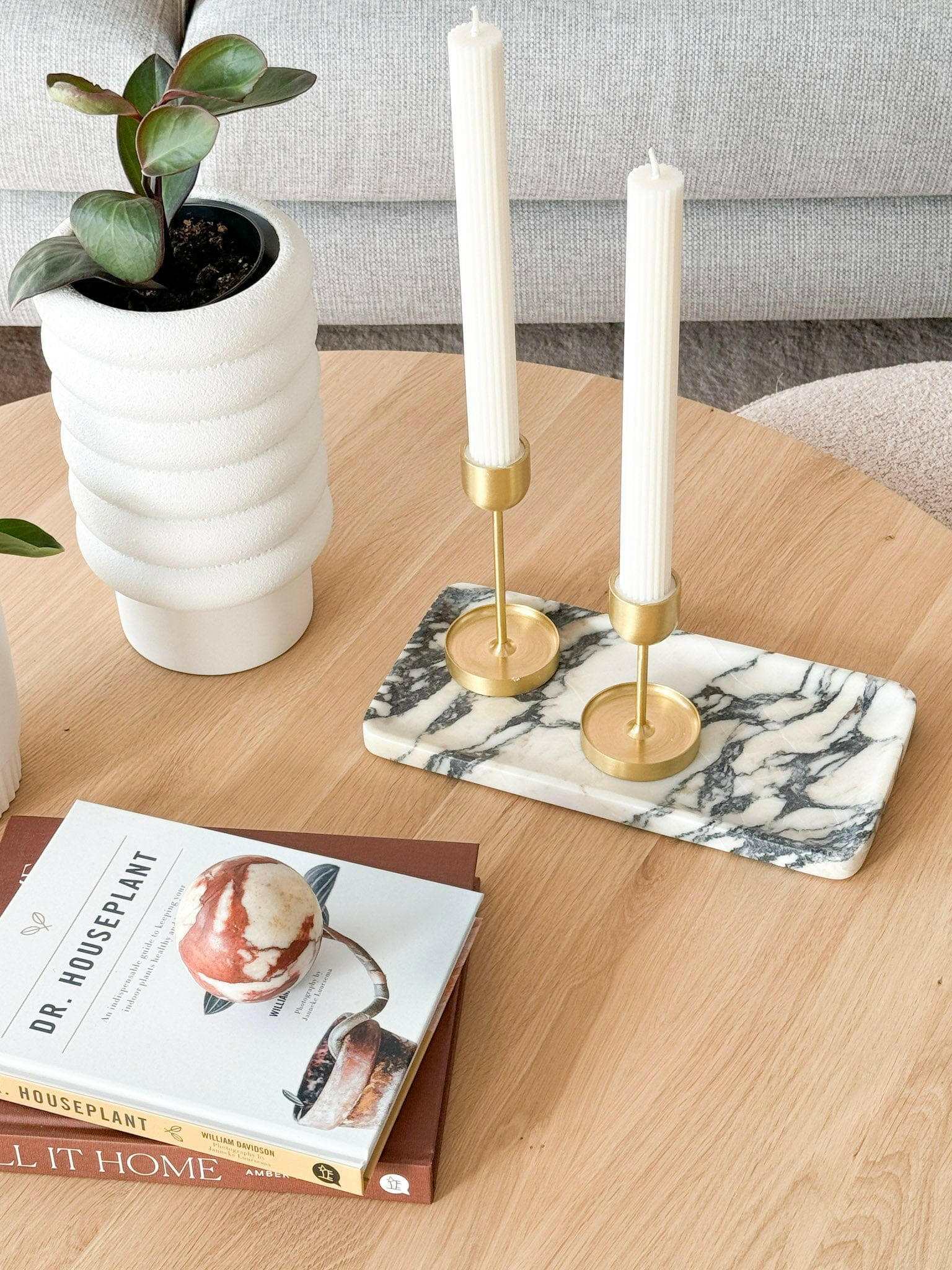 Linea Rectangle Marble Tray in Calacatta Viola with violet veins used as elegant organizer with gold candle holders on wooden table