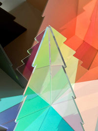norsu Studio Perspex iridescent standing Christmas tree with 3D interlocking design and colorful light reflections