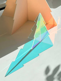 norsu Studio Perspex standing Christmas tree in mixed colors with modern minimalist design and elegant light reflections