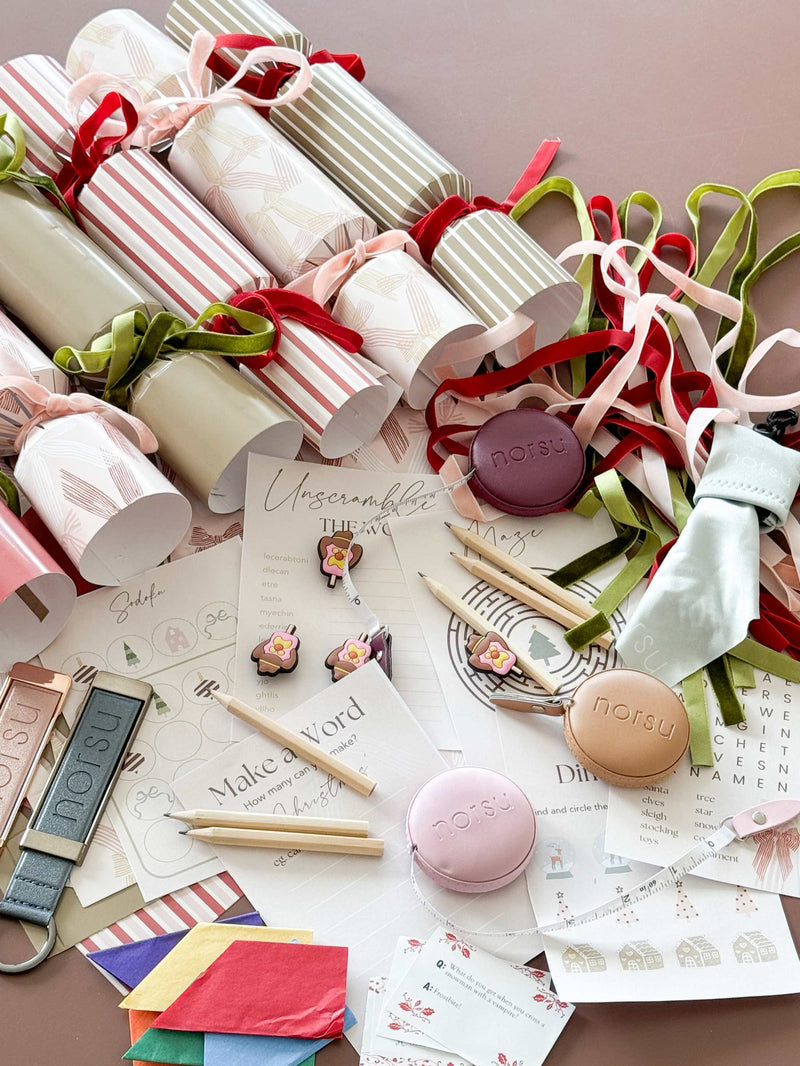 norsu Studio customizable Christmas crackers set with velvet ribbons and festive fillers