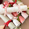 norsu Studio Build Your Own Christmas Crackers set with velvet ribbons and festive designs