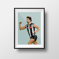 Framed Dom Gauci Kids Art Print of Josh Daicos in Collingwood AFL football uniform on sage background