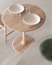 Ethnicraft Oak Torsion Dining Table, styled in a room setting