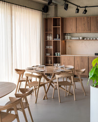 Ethnicraft Oak Mikado Round Dining Table, styled in a room setting