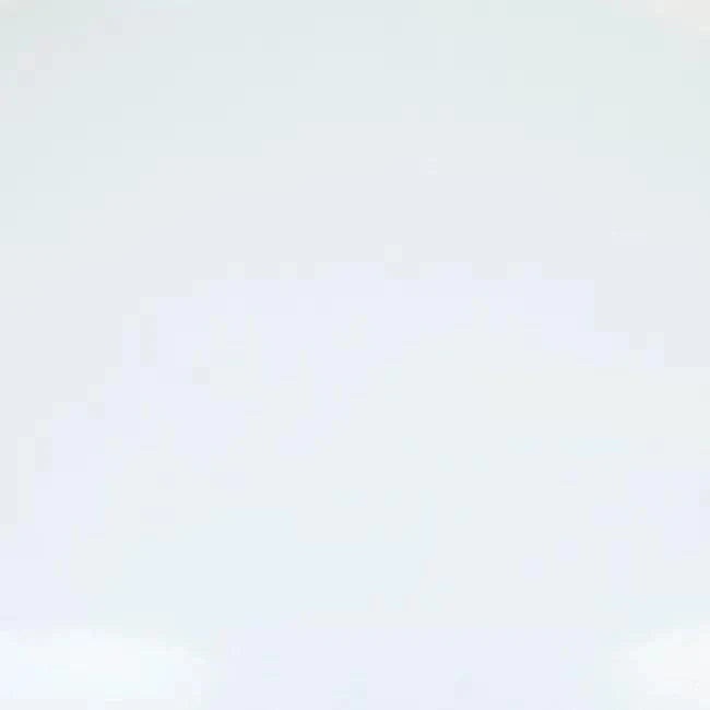 GlobeWest Easton Curve Lamp with iron base and overcast curved shade for soft ambient lighting