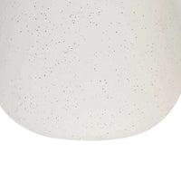 Close-up of the GlobeWest Lorne Pebble Table Lamp base with white sand matte ceramic finish and subtle speckled texture