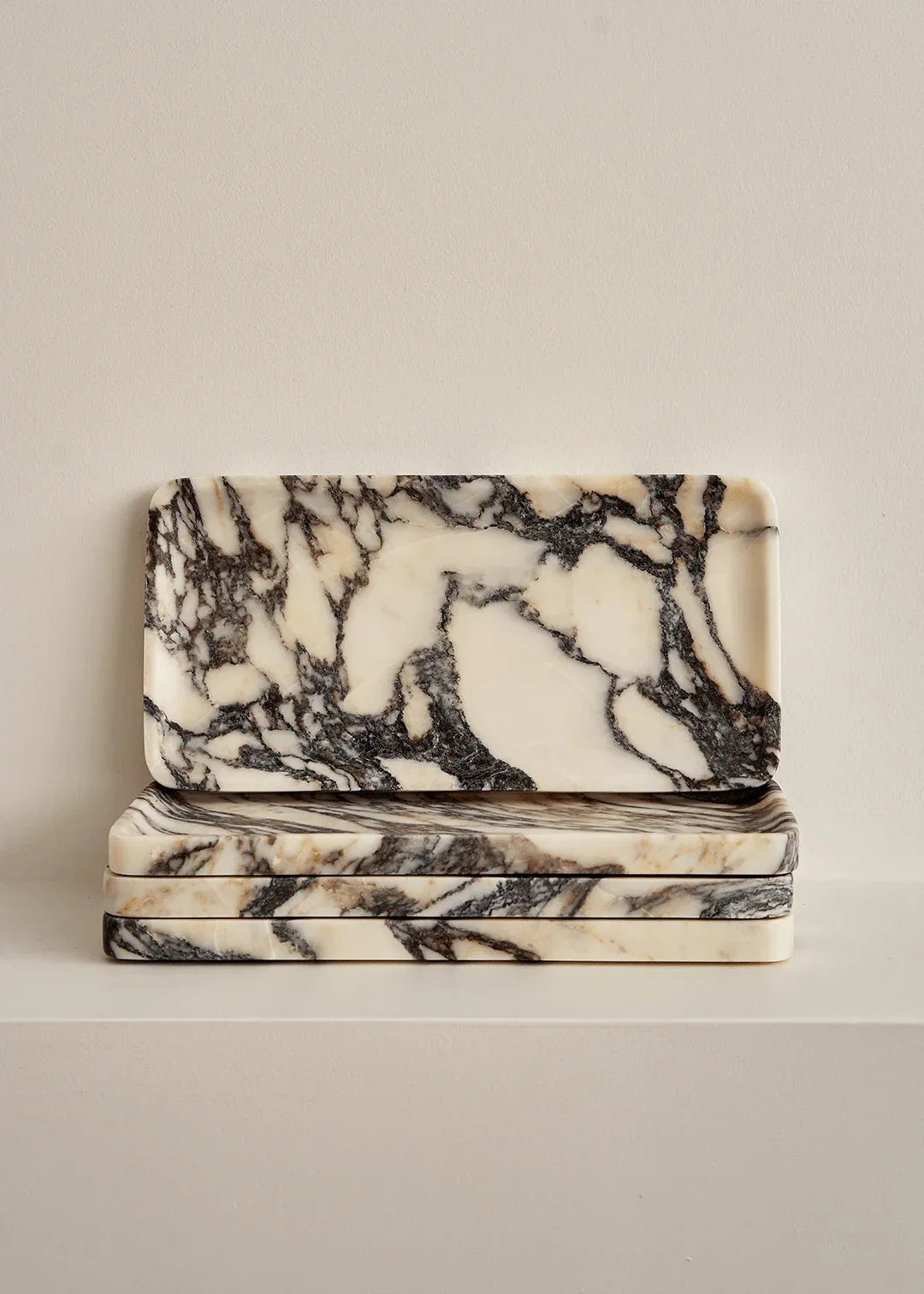 Linea Rectangle Marble Tray in black and white Calacatta Viola marble with organic veining and minimalist design