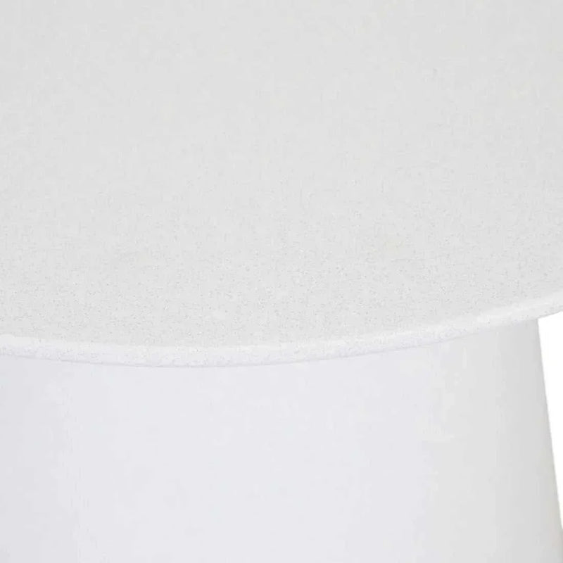 Close-up of Globe West Livorno white round fibrestone side table for indoor and outdoor use
