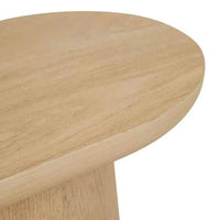 Globe West Seb Pedestal Side Table in natural oak with narrow oval top and cantilever design