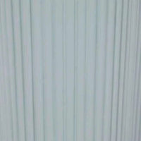 Powder blue Artie Wave Ripple Side Table with ripple pillar base and timber veneer finish