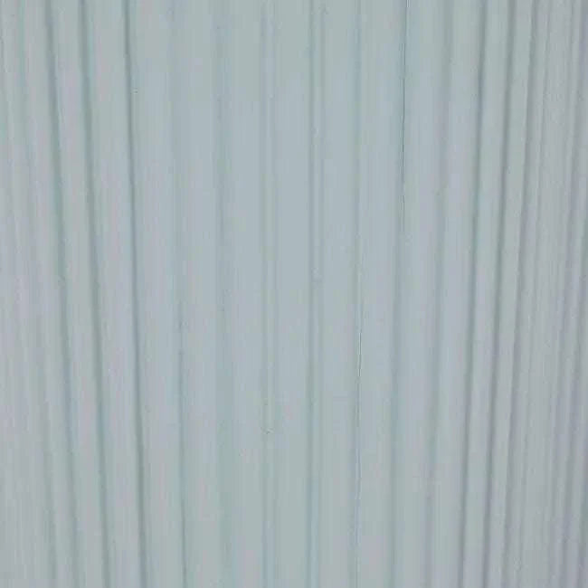 Powder blue Artie Wave Ripple Side Table with ripple pillar base and timber veneer finish