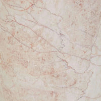 Close-up of Cream Rose marble surface with natural veining from Pippa Marble Side Table