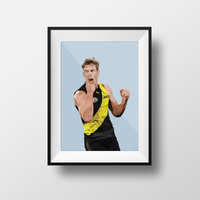DG Designs Dom Gauci Kids Art Print of Tom Lynch in Richmond FC AFL jersey with powder blue background in black frame