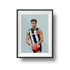 Framed DG Designs Dom Gauci kids art print of Nick Daicos in Collingwood AFL football uniform on sage green background