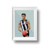 Framed DG Designs Dom Gauci kids art print of Nick Daicos in Collingwood AFL football uniform on sage green background