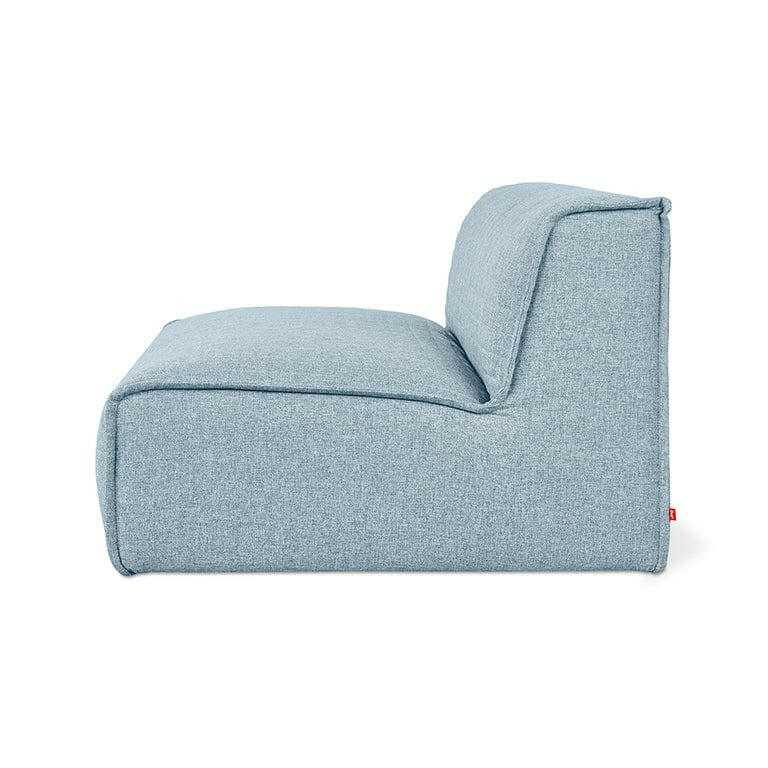 Gus Nexus armless modular sofa with two chairs and ottoman in Parliament Lake fabric