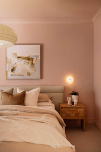 Modern styled bedside table with decor and soft furnishings for bedroom bedside table styling eService