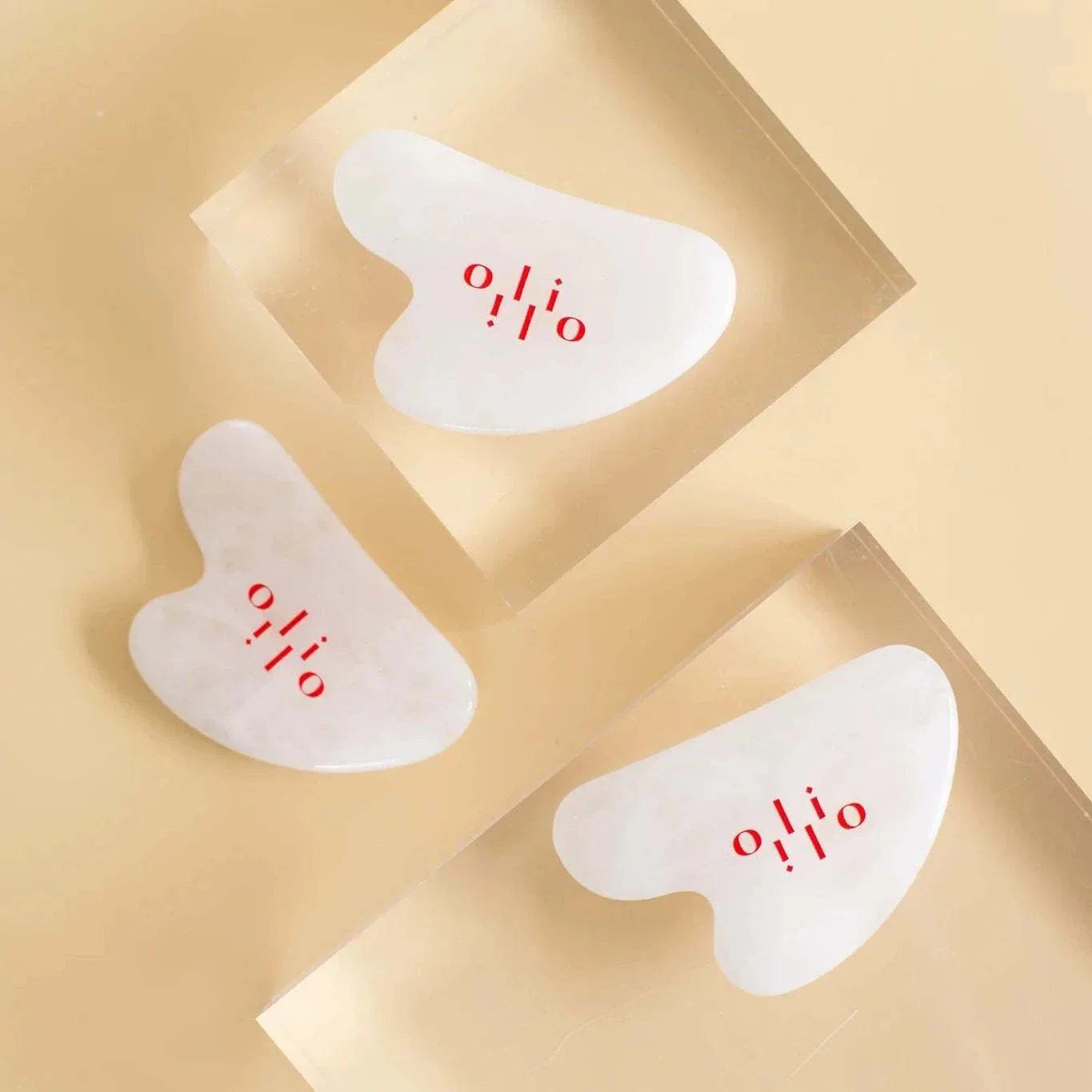 White Jade Sculpting Tool by OliOli for face and body massage with balancing and soothing properties