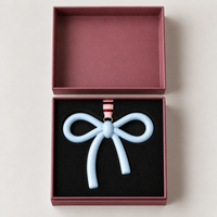 norsu STUDIO Christmas Ceramic Bow Ornament, Powder Blue
