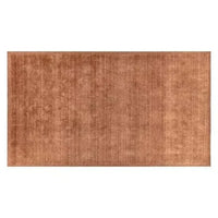 GlobeWest Bower Frame Rug in rust color, handwoven wool with elegant framed design and plush texture.