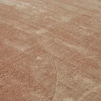 GlobeWest Tepih Curve Rug in dusty rose with subtle geometric pattern and soft sheen, handwoven indoor area rug.
