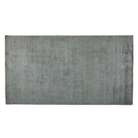 GlobeWest Tepih Neptune Rug in ocean green, hand-loomed wool blend area rug with subtle rustic texture.
