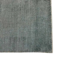 GlobeWest Tepih Neptune Rug in ocean green with hand-woven wool blend texture