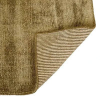 GlobeWest Tepih Neptune Rug in olive, hand-woven wool blend with subtle rustic texture, indoor area rug with striped backing.