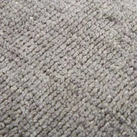 Close-up texture of GlobeWest Tepih Neptune round rug in dove grey showing hand-woven wool, silk, and cotton fibers