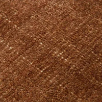 Close-up of GlobeWest Tepih Neptune Round Rug in ginger color showing textured woven fabric