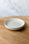 Coastal Junction 28cm salad bowl in cream with green stripe on wooden table