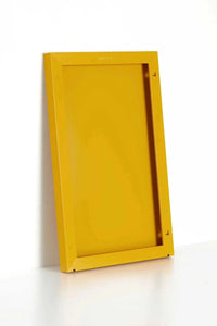 Yellow magnetic storyboard with powder coated finish designed to match Mustard Made lockers, suitable for versatile wall hanging and planning uses.