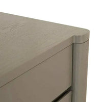 Close-up of GlobeWest August 3 Drawer Bedside in Snowgum ash veneer with smooth rounded edges and sleek drawer design