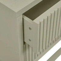 Close-up of Putty Benjamin Ripple Bedside drawer with textured ripple motif and timber construction