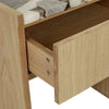 GlobeWest Elsie bedside table with natural ash veneer and open drawer showing wood grain details