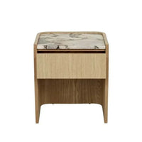GlobeWest Elsie bedside table with matt ocean marble top and natural ash veneer, featuring soft curved edges and a drawer for storage