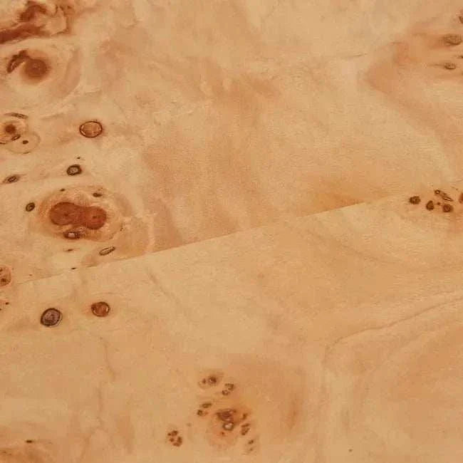 Light burl veneer texture with natural grain variations on Trove Burl Bedside Table surface